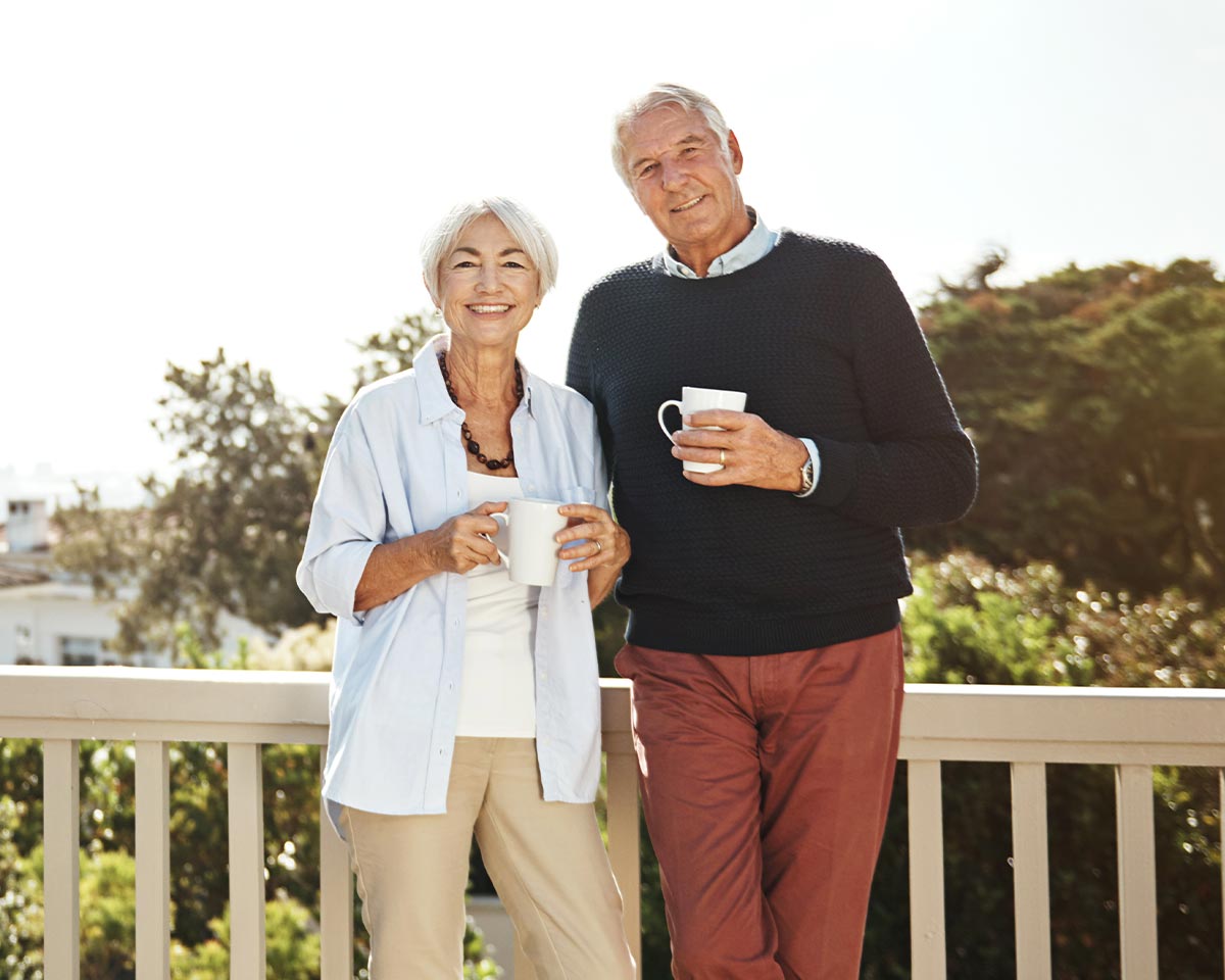 couple holding cups