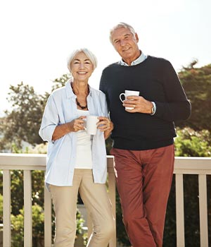 couple holding cups